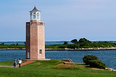 Two Women Walking Towards Lighthouse at Connecticut Universty